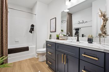 Luxurious soaking tub with rain fall shower head